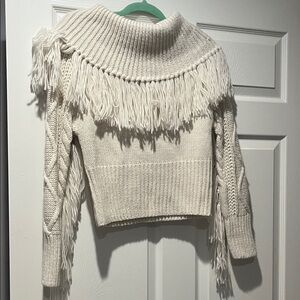 Elegant Cream Turtleneck Sweater with Fringe